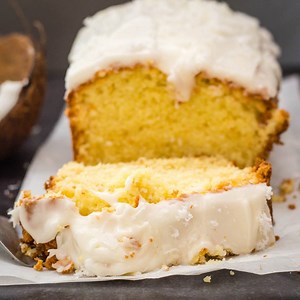 Creamy Vanilla Frosted Coconut Pound Cake an Easy, Moist perfect anytime Sweet Loaf. Get the Recipe - https://anitalianinmykitchen.com/coconut-pound-cake/ | An Italian in my kitchen