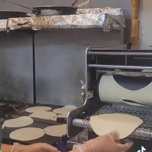 Look at our machine go! 🙌 Homemade tortillas every day, all day, at Taco-tastic! Do you want this machine in your kitchen? Visit our website for details: www.tortillamachine.com | Tortilla Masters