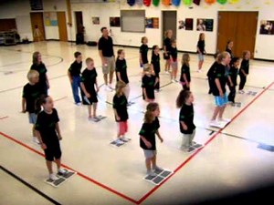 Wii Fit class of 30 students doing Step Aerobics on Active Practice Boards