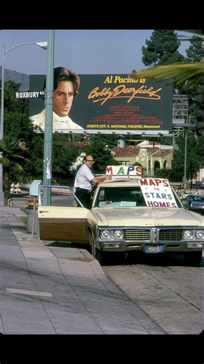 A man selling maps to the stars out of his 1970 Buick Wagon in Los Angeles, California in 1977. #backintheday #History #1970s #losangeles #california