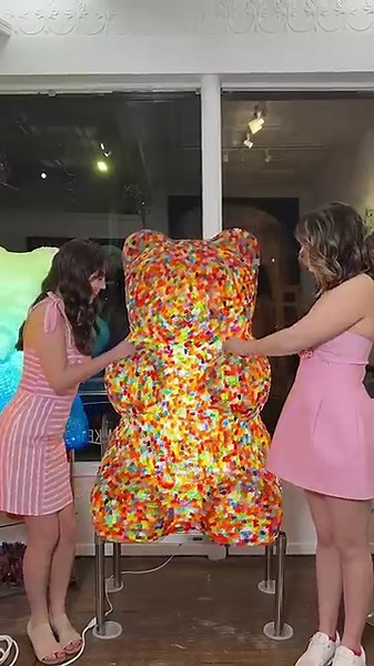 Inside a giant gummy bear sculpture made of real candy
