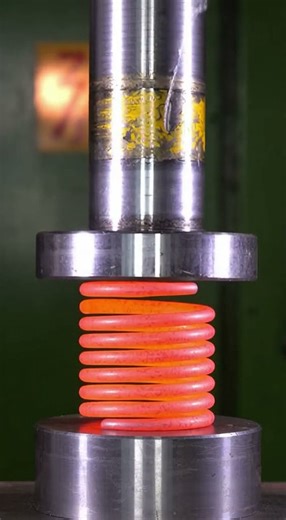 Hydraulic Press Compressing a Red-Hot Metal Spring in Slow Motion