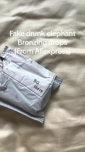 Fake drunk elephant bronzing drops! #fyp #viral #aliexpress #skincare #drunkelephant #fake #scam #gross #follow