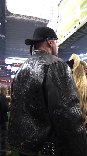 Undertaker cheers on Texas Football after their first TD of the Big 12 Championship game! | WWE
