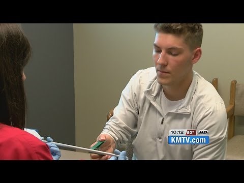 Hand reattachment surgery a success for young Nebraska man