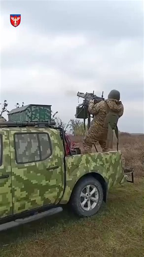 Ukrainian serviceman shots down a Russian Shahed/Geran-type long-range strike drone with the twin-mounted M1910 Maxim machine guns installed on a pick-up.