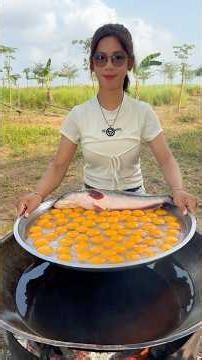 Cooking yummy deep fried egg and fish recipe