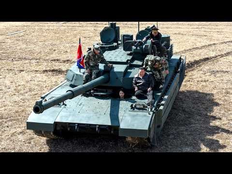 The daughter of the leader of the DPRK on an M2020 tank.