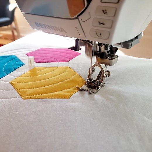 The Circular embroidery attachment #83 allows you to sew, quilt, and embroider perfect circles or semicircles and is easily screwed directly to the free-arm. Read theh article at #WeAllSew to find tips and techniques to get started using the Circular embroirdery attachment here: https://weallsew.com/circular-embroidery/ #berninausa #madetocreate #ilovebernina | BERNINA USA
