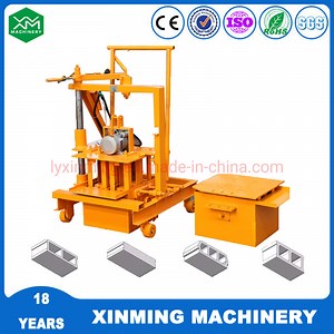 [Hot Item] Xinming Widely Used Qtj4-40 Manual/ Semi Automatic Paver Block Machine with Electrical Vibration