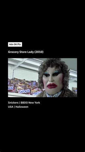 Ads OK Plz | Advertising & Marketing on Instagram: "In 2010, Snickers dropped a spooky Halloween ad that quickly caught attention. Set in a grocery store, the commercial shows a woman being approached by a “woman” who looks a little...off. Turns out, it's actually two kids stacked in a costume! The fake woman points out her lack of Snickers, then starts piling them into her cart, explaining that kids love getting Snickers on Halloween. The ad wraps up with the kid on the bottom whispering to the
