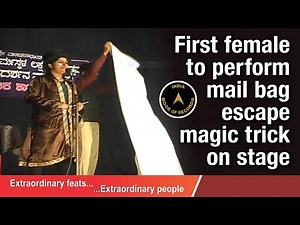 First female to perform mail bag escape magic trick on stage