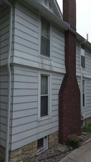 This home had asbestos siding, so we removed it before giving it the fresh new look