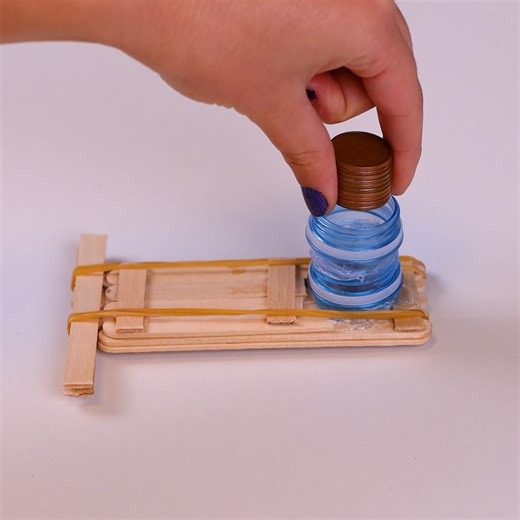 Watch this mini coin catapult in action! | Art & Painting