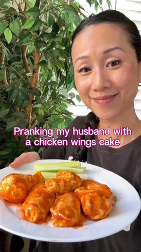 Huiwen on Instagram: "I think he liked them? I made chicken wings out of came to prank my husband and used real hot sauce because I ran out of time. #husbandandwife #cake #prank #realisticcake #wings"