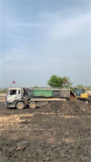 200 dump truch burying deep lake #short #viralshort #constructionvehicle