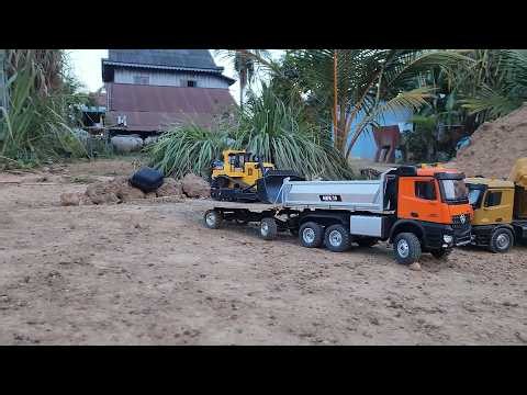 RC Huina Dump Truck Transporting Heavy Bulldozer to Job Site!