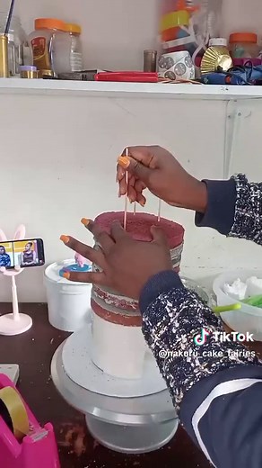 Decorating a Train Cake with Dummy Cakes for a Perfect Finish