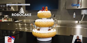 Researchers develop cake with robotic toppers, LED candles powered by edible battery