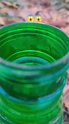 green bottle water trick revealed 🍾 #satisfying #shorts
