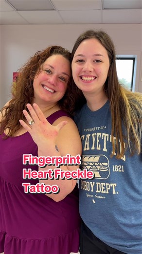 Fingerprint heart freckle tattoo | kids finger prints on parents hand tattoo