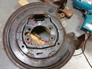 2006 Liberty brake backing plate