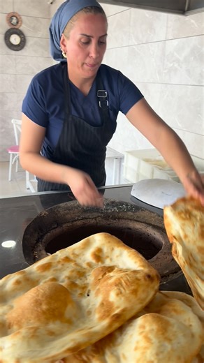 NEHİR LAVAŞ on Instagram: "Her tandır ekmeği, ateşle yoğrulmuş bir emek hikâyesidir.”🌾💐🌾🌺#keşfetteyiz #tandırekmeği #kesfet #tandırdalavaşekmek #keşfetedüş"