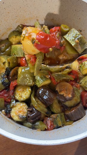 This is Greek Tourlou. A traditional Greek dish made with garden-fresh summer vegetables cooked with lots of extra virgin olive oil. Hearty, flavorful, and nutritious! Full recipe here: https://realgreekrecipes.com/greek-vegetable-stew/ | Real Greek Recipes