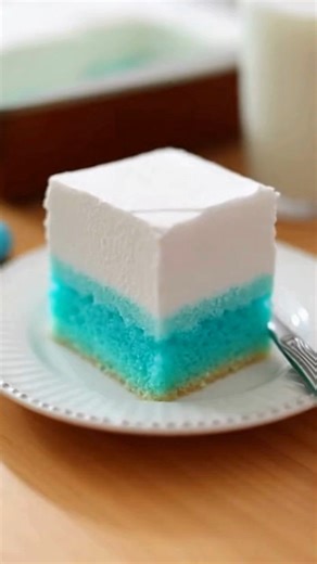 Easy 4-Ingredient Blue Raspberry Shortcake Cool Whip Cloud Cake Whimsical Blue Raspberry Shortcake Cool Whip Cloud Dream Cake Recipe Ingredients: 1 box vanilla or white cake mix (prepared according to package directions) 1 cup blue raspberry gelatin (prepared and slightly cooled) 1/2 cup sweetened condensed milk 1 tub Cool Whip, thawed (8 oz) Directions: Prepare and bake the vanilla or white cake mix in a 9x13-inch pan according to package directions. Allow the cake to cool slightly. While the c
