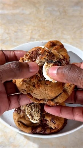This holiday season, @terrencebakes is celebrating with 12 cookies in his “Cookie Countdown.” Today’s: Spiced S’mores Cookies - torched marshmallows mixed right into the batter, Biscoff spice, and a roasted marshmallow on top. Stay tuned for the next 11. Recipe at the link in our bio, or comment ‘cookie’ to have it DMd straight to you. #f52community | Food52