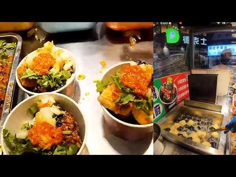 Cooking deep fried stinky tofu. street food.