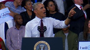 Obama calms supporters when Trump protester appears