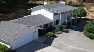 IKO Cambridge Harvard Slate #shingles offer a timeless, classic look that enhances any home's #curbappeal. 🏠✨ They pair beautifully with white or grey stone, brick, or siding, and complement black, white, or grey trim for a polished finish. | IKO Roofing