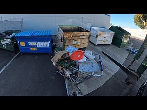 Waste Management front load commercial recycling truck