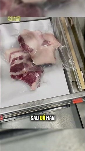 Testing an industrial food vacuum sealing machine.