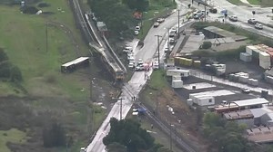 Australian passenger train hits abandoned car, derails
