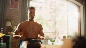 Strong Athletic Black Man Does Shirtless Workout at Home Gym, Exercising on stylish Rowing Machine. Muscular Mixed Race Sportsman with Cool Tattoo Staying Healthy, Training. Sweat and Determination.