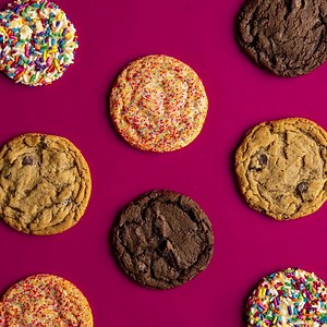 One delivery, extra sweet. For Boss's Day, give your boss the gift of fresh-baked Cookies sent right to their doorstep! Find us on your favorite delivery app 😋 | Great American Cookies