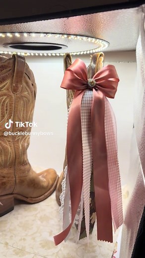 Stylish Bows on Cowboy Boots by Megan Moroney
