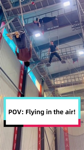 An acrobat spins 1440° high in the air before being perfectly caught by his partner. From this first-person view, what impresses you the most? The courage to spin in midair or the flawless teamwork that made it possible? | Discover China