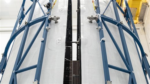 NASA's Psyche spacecraft encapsulated into SpaceX Falcon Heavy payload fairings