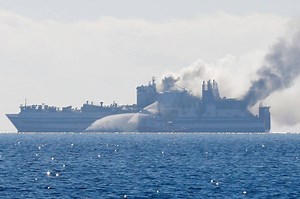 Passenger found alive on Greece-Italy ferry after blaze, 11 still missing