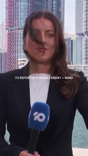 TV Reporter Struggles with Wind Challenges
