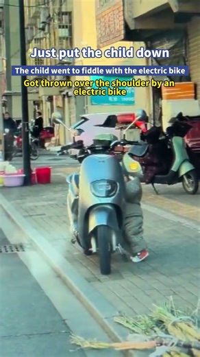 Just put the child down，The child went to fiddle with the electric bike.