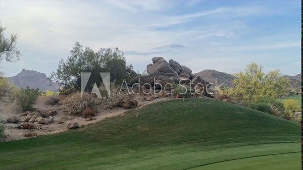 A desert golf course located in the American southwest.