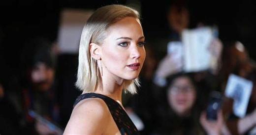 Jennifer Lawrence Accidentally Kisses Natalie Dormer at 'Hunger Games' Premiere