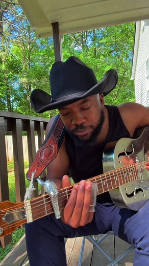 Playing Delta Blues on Slide Guitar on the Porch