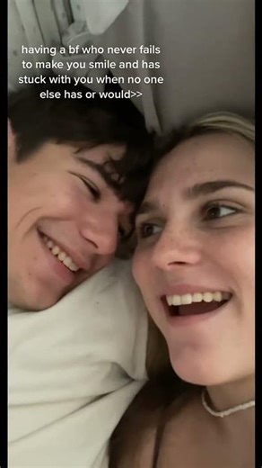 Cute Couple Sharing a Moment of Love and Laughter in Cozy Bed Setting#CoupleGoals