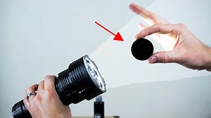 The worlds blackest black vs. the worlds brightest flashlight