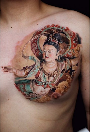 Chinese Angel👼🏻Restoring art from thousand years ago on human skin with tattoo machine 24 hours full process in 60s 3 sessions in a row 今天挑戰在皮膚上復原千年前的敦煌飛天雕塑 耗時3天24小時 精華都濃縮在這60s 背景採用了手繪的方式，加入了敦煌風格的祥雲搭配 #tattoo #tattooideas #asmr #artist #detailing